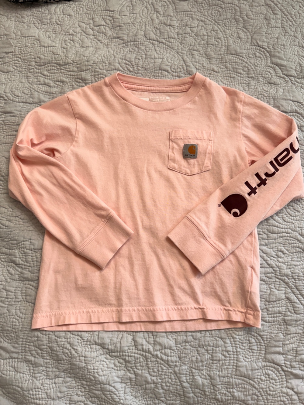 Carhartt Kids Long-Sleeve Pocket Tee in Soft Pink with Burgundy Logo